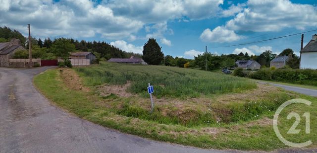 Afficher la photo en grand terrain à vendre - 2000.0 m2 - POMMERIT LE VICOMTE - 22 - BRETAGNE - Century 21 Le Calvez