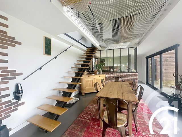 Afficher la photo en grand maison à vendre - 8 pièces - 175.0 m2 - POMMERIT LE VICOMTE - 22 - BRETAGNE - Century 21 Le Calvez