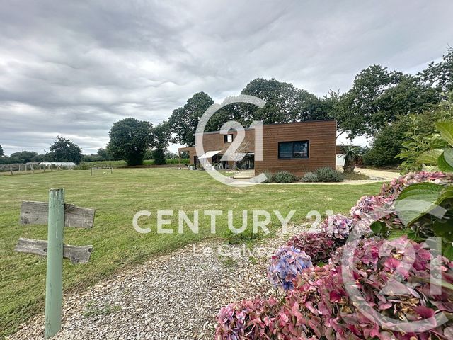 Afficher la photo en grand maison à vendre - 8 pièces - 175.0 m2 - POMMERIT LE VICOMTE - 22 - BRETAGNE - Century 21 Le Calvez