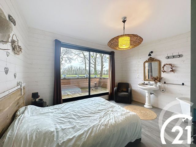 Afficher la photo en grand maison à vendre - 8 pièces - 175.0 m2 - POMMERIT LE VICOMTE - 22 - BRETAGNE - Century 21 Le Calvez