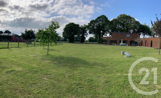 Afficher la photo en grand maison à vendre - 8 pièces - 175.0 m2 - POMMERIT LE VICOMTE - 22 - BRETAGNE - Century 21 Le Calvez