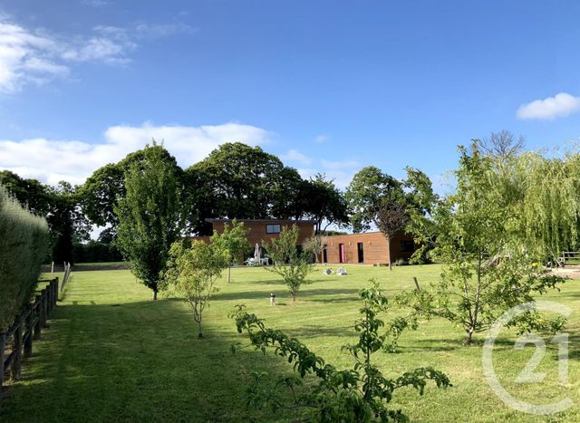 Afficher la photo en grand maison à vendre - 8 pièces - 175.0 m2 - POMMERIT LE VICOMTE - 22 - BRETAGNE - Century 21 Le Calvez