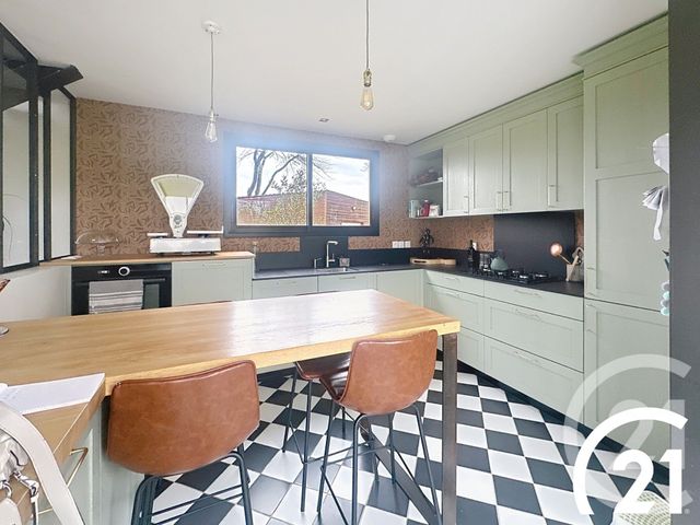 Afficher la photo en grand maison à vendre - 8 pièces - 175.0 m2 - POMMERIT LE VICOMTE - 22 - BRETAGNE - Century 21 Le Calvez