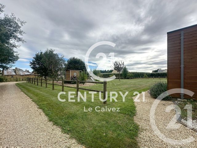 Afficher la photo en grand maison à vendre - 8 pièces - 175.0 m2 - POMMERIT LE VICOMTE - 22 - BRETAGNE - Century 21 Le Calvez