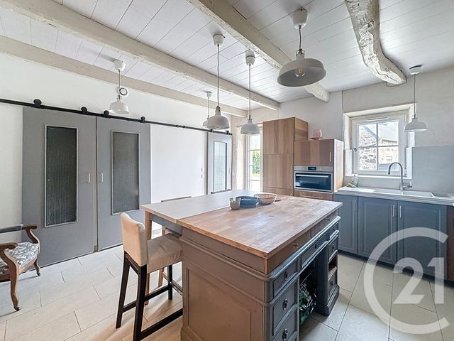 Afficher la photo en grand maison à vendre - 9 pièces - 209.29 m2 - MOUSTERU - 22 - BRETAGNE - Century 21 Le Calvez